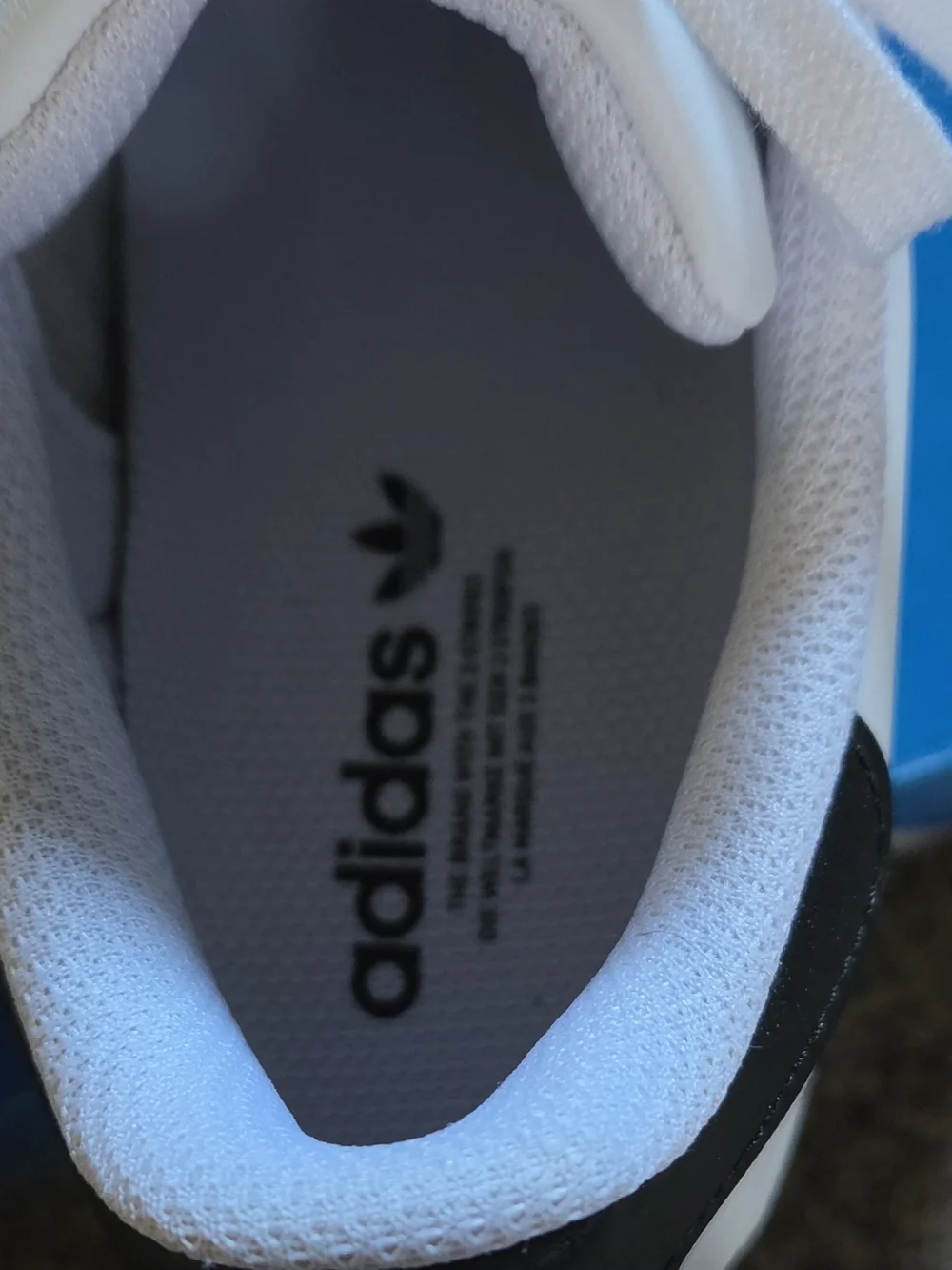 Adidas Superstar White Sneakers with Black Stripes
